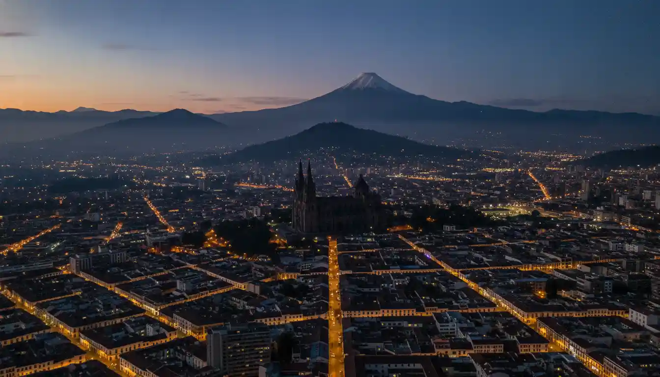 Quito old town at dusk with the Andes and Cotopaxi, Ecuador residency destination